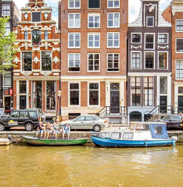 Building with river and boats